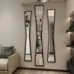 Add a touch of elegance to your home décor with this stunning Full-length Irregular Gold Mirror. This versatile piece can be used as an Entryway Mirror to make a statement as soon as guests walk through the door, or as a Vanity Mirror for your morning routine. The unique irregular shape adds a modern twist to the classic design, making it perfect for any space. Whether you need a Narrow Mirror for a small area or a Long Mirror to add depth to a room, this gold beauty is sure to impress. Elevate your space with this stylish and functional piece of home décor.
