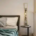 Add a touch of elegance to your home decor with this stunning Full-length Irregular Gold Mirror. Perfect for an entryway or a vanity area, this sleek and stylish mirror is both functional and beautiful. The narrow design of this long mirror makes it easy to fit into any space, while the irregular shape adds a unique and modern touch. Elevate your space with this stunning piece that will surely become a statement in any room.