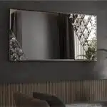 Black frame handmade beveled mirror with diagonal artwork