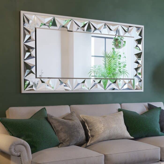 Elegant silver rectangular mirror with prism-shaped artwork, perfect for modern and classic interiors.