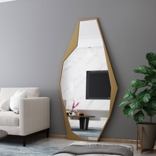 Add a touch of contemporary elegance to your living space with this Modern Full-Length Free Standing Irregular Gold Mirror. This Unique Asymmetrical Floor Mirror is not your average vanity mirror - its irregular shape and eye-catching design make it a standout piece of decor. Perfect for any room in your home, this Irregular Vanity Mirror will instantly elevate your space with its Aesthetic Design. Make a bold statement with this full body mirror that doubles as a stunning piece of art. Give your living room a stylish update with this striking and unique addition.