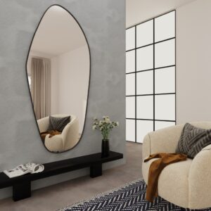 Add a touch of modern elegance to your space with this stunning ASYMMETRICAL VANITY MIRROR. This unique piece features an Irregular Mirror design that is perfect for adding a stylish flair to your Entryway or Bathroom. The Gold Wall Mirror adds a glamorous touch, while the Large Mirror size makes it perfect for wall décor or as a Full length Mirror. Elevate your home decor with this chic and versatile piece that is sure to make a statement in any room.