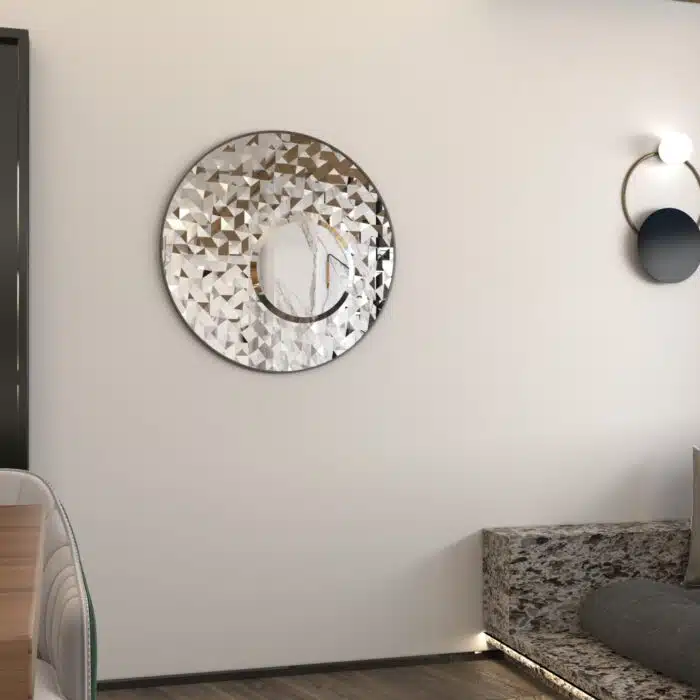 Add a touch of modern elegance to your living room or bathroom with this stunning Round Asymmetrical Mirror. This unique accent decor piece features a large circle wall mirror with a decorative sunburst style, making it the perfect statement piece for any space. Whether used as a bathroom vanity mirror or as a focal point in your living room, this mirror is sure to elevate your decor with its sleek and stylish design. Make a bold statement with this eye-catching mirror that seamlessly blends style and function.
