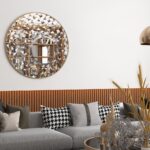 Introducing our stunning Round Asymmetrical Mirror, perfect for adding a touch of elegance to your living room decor or bathroom vanity. This unique accent decor piece features a large circle design in a decorative sunburst style, sure to catch the eye and elevate the aesthetic of any space. Whether hung on a wall or displayed on a dresser, this mirror is both functional and stylish, making it a must-have piece for your home. Brighten up your space with this statement mirror today!