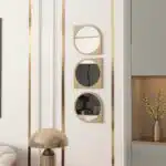 Elevate the style of your bathroom or living room with this stunning Asymmetrical Bathroom Vanity Mirror. Featuring a Round Irregular design and a Unique curved shape, this mirror adds a touch of modern elegance to any space. The Aesthetic Long Gold finish brings a touch of luxury, making it the perfect statement piece for your home. Complete your living room set with this one-of-a-kind mirror that is sure to impress your guests.
