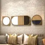 Elevate the style of your bathroom or living room with this stunning Asymmetrical Bathroom Vanity Mirror. Featuring a Round Irregular design and a Unique curved shape, this mirror adds a touch of modern elegance to any space. The Aesthetic Long Gold finish brings a touch of luxury, making it the perfect statement piece for your home. Complete your living room set with this one-of-a-kind mirror that is sure to impress your guests.