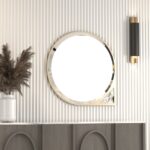 Elevate the style of your bathroom or living room with this stunning Asymmetrical Bathroom Vanity Mirror. Featuring a Round Irregular design and a Unique curved shape, this mirror adds a touch of modern elegance to any space. The Aesthetic Long Gold finish brings a touch of luxury, making it the perfect statement piece for your home. Complete your living room set with this one-of-a-kind mirror that is sure to impress your guests.