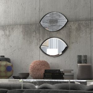 Add a touch of mystique and charm to your space with this stunning Evil Eye Mirror. This Small Wall Mirror exudes elegance and sophistication, making it a perfect addition to your bathroom or vanity area. Crafted in an elegant oval shape, this Art Deco Mirror is not just a functional piece, but also a work of art that will enhance your home décor. The intricate design of this Gold Wall Mirror with its evil eye motif is sure to catch the eye and bring a unique flair to any room. Elevate your space with this handmade, decorative mirror that combines style and functionality seamlessly. Make a statement with this one-of-a-kind piece of Wall Decor that is sure to be a conversation starter in any room.