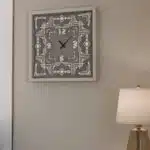Add a statement-making touch to your living room or kitchen decor with this unique large wooden wall clock. This elegant timepiece is the perfect housewarming gift idea for those who appreciate stylish home decor. With its modern design and oversized silhouette, this large clock is sure to make a statement on any wall. Available in black, gray, gold, beige, and silver, this large wall clock is not only functional but also adds a touch of sophistication to any space. Whether you're looking for a kitchen clock or a living room clock, this silent wall clock is the perfect addition to your home. Upgrade your decor with this stylish and chic square wall clock today!