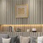 Add a touch of modern sophistication to your living room or kitchen decor with this unique large wall clock featuring a stunning 3D effect look design. This elegant timepiece is not only functional but serves as a stylish statement piece for any home. This oversized clock is available in black, gray, gold, beige, and silver, perfect for complementing any color scheme. Whether for yourself or as a housewarming gift idea, this silent, square wall clock will surely impress. Elevate your space with this chic and contemporary piece that embodies both form and function.