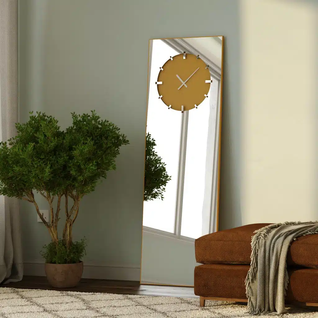Add a touch of elegance and functionality to your living space with this stunning Standing Mirror with Clock. This floor mirror doubles up as a leaner mirror with a unique Minimal Mirror Clock design, perfect for adding a modern touch to your room décor. This Large Big wall mirror in gold black silver tones is a show-stopping piece that is sure to impress. Whether used in the living room as a focal point or in the entryway for a stylish welcome, this Elegant Designer Mirror for chic homes is a versatile addition to any room. Elevate your space with this Designer Mirror clock that also serves as a Vanity Mirror, adding both style and practicality in one exquisite piece.