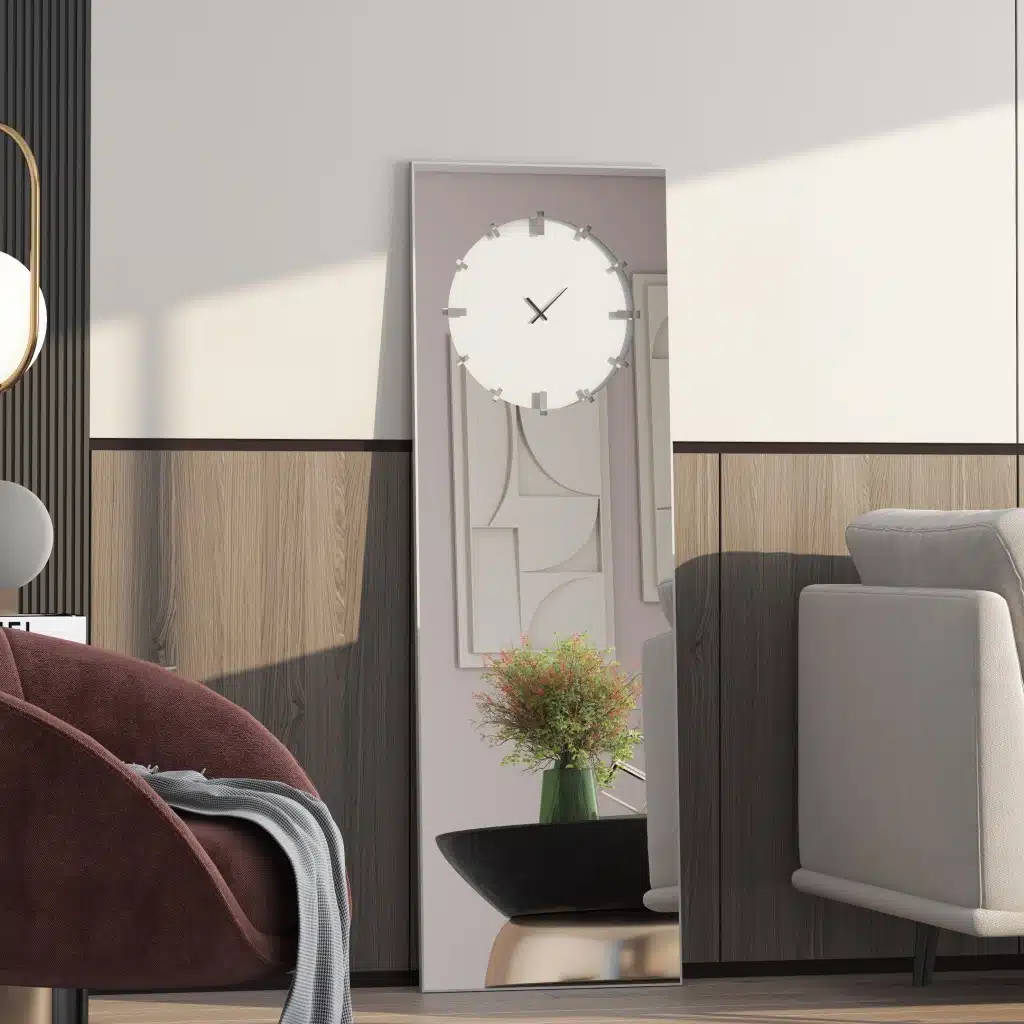 Add a touch of elegance and functionality to your living space with this stunning Standing Mirror with Clock. This floor mirror doubles up as a leaner mirror with a unique Minimal Mirror Clock design, perfect for adding a modern touch to your room décor. This Large Big wall mirror in gold black silver tones is a show-stopping piece that is sure to impress. Whether used in the living room as a focal point or in the entryway for a stylish welcome, this Elegant Designer Mirror for chic homes is a versatile addition to any room. Elevate your space with this Designer Mirror clock that also serves as a Vanity Mirror, adding both style and practicality in one exquisite piece.