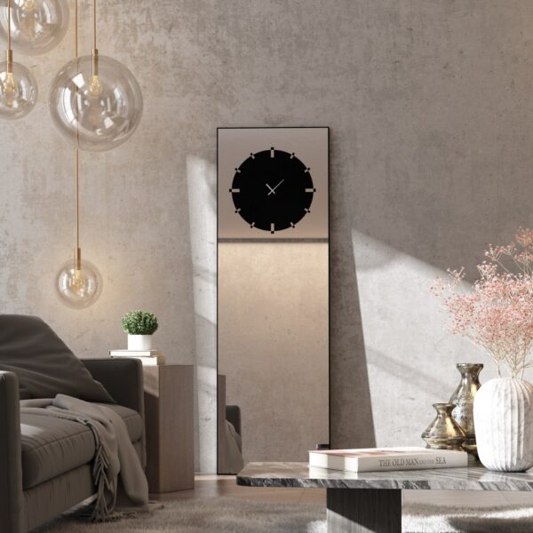Enhance the elegance of your living space with our exquisite Standing Mirror with Clock. This unique design combines the functionality of a floor mirror with the sophistication of a leaner mirror, featuring a sleek Minimal Mirror Clock that adds a modern touch to any room. The Large Big wall mirror is a statement piece, perfect for your entryway or as a stunning focal point in your living room. Crafted with a blend of gold, black, and silver accents, this Elegant Designer Mirror exudes chic style and complements any decor. Elevate your home with this versatile piece that doubles as a Vanity Mirror, making it a must-have for those who appreciate luxurious and trendy design elements.