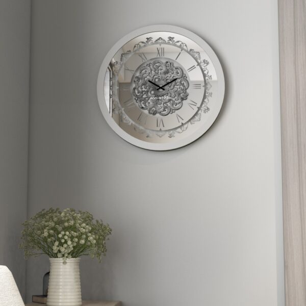 Add a touch of vintage charm to your living space with this stunning Silver Color Round Wall Clock. Featuring elegant Roman Numerals, a Curved Wood Center, and an Antique finish, this Large Wall Clock is perfect for adding a unique touch to your kitchen or living room decor. Whether you need a statement piece with this Oversized Wall Clock or a simple timepiece with this Silent Wall Clock, this Retro-inspired design is sure to impress. Don't miss out on this must-have item for anyone seeking a blend of classic and contemporary style!