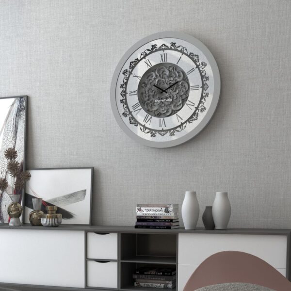 Add a touch of vintage charm to your living space with this stunning Silver Color Round Wall Clock. Featuring elegant Roman Numerals, a Curved Wood Center, and an Antique finish, this Large Wall Clock is perfect for adding a unique touch to your kitchen or living room decor. Whether you need a statement piece with this Oversized Wall Clock or a simple timepiece with this Silent Wall Clock, this Retro-inspired design is sure to impress. Don't miss out on this must-have item for anyone seeking a blend of classic and contemporary style!