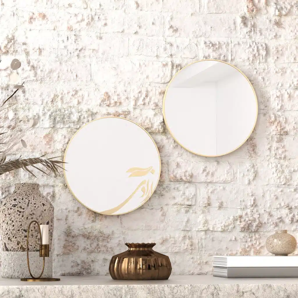 Small round handmade wall mirror with Persian calligraphy design featuring the word 'Freedom' etched on the mirror surface, available with black or gold frame.