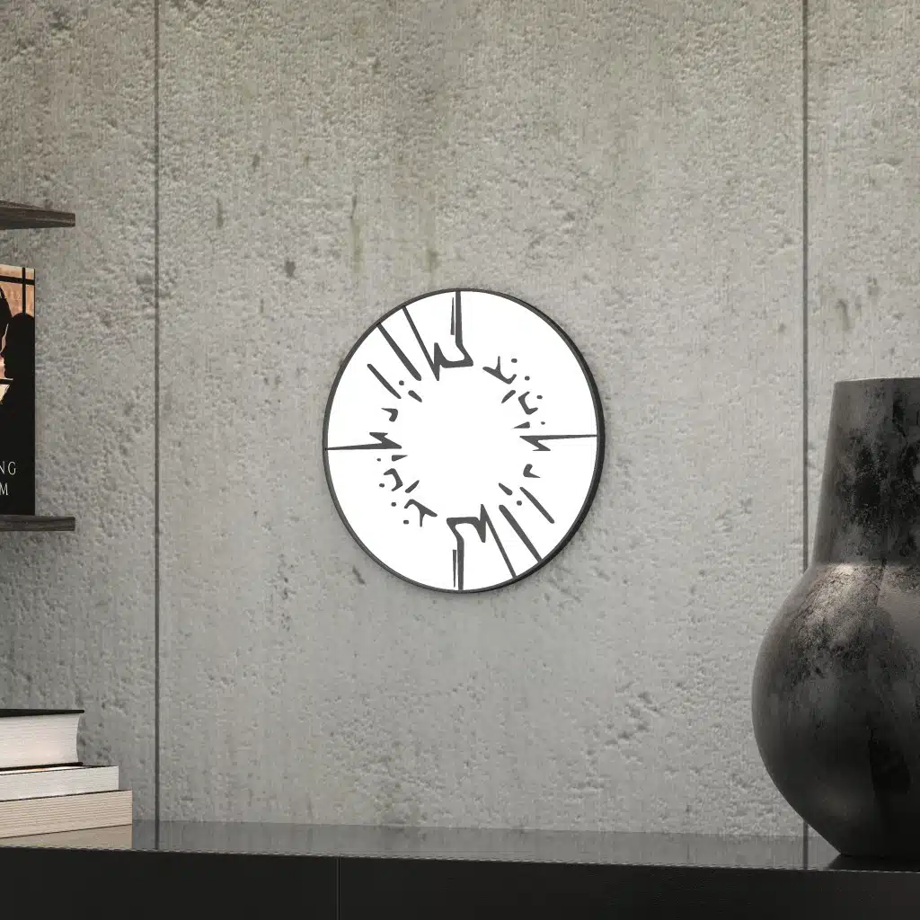 Small round wall mirror with an etched Persian calligraphy design featuring the words 'Women, Life, Freedom,' framed in a gold and black color scheme, hanging on a wall.