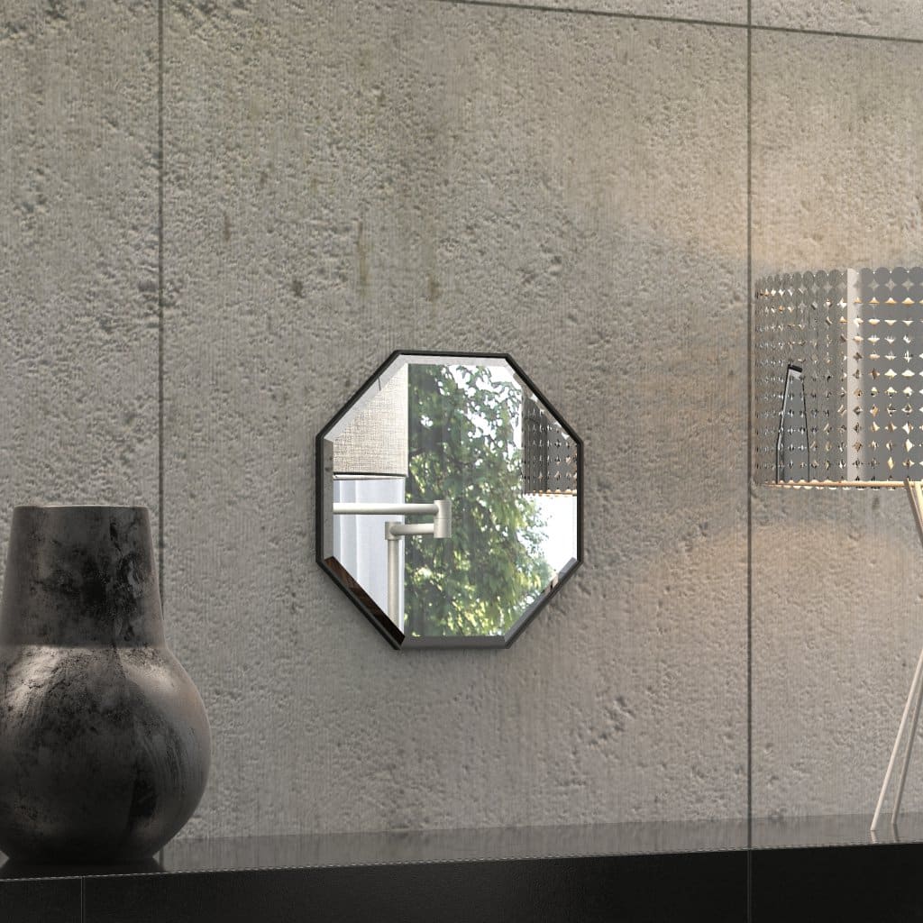 A octagonal wall mirror elegantly mounted on a wall adjacent to a well-stocked bookshelf, enhancing the room's aesthetic appeal.