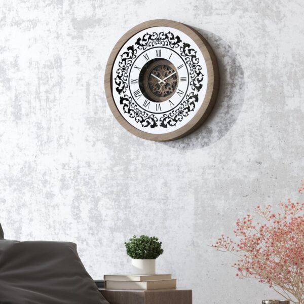 Handmade round wall clock with a wooden frame in walnut patina, mirrored glass front featuring Roman numerals, and a floral carved wood center, perfect for elegant home decor.