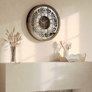 Handmade round wall clock with a wooden frame in walnut patina, mirrored glass front featuring Roman numerals, and a floral carved wood center, perfect for elegant home decor.