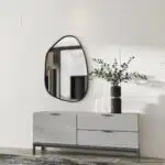 Irregular-shaped wooden frame wall mirror with asymmetrical design, perfect for modern home décor and bathroom vanities