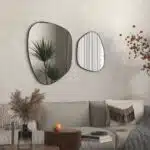Irregular-shaped wooden frame wall mirror with asymmetrical design, perfect for modern home décor and bathroom vanities