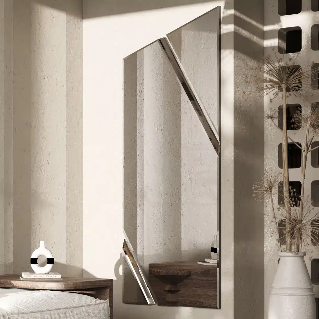 Full-length angled wall mirror with beveled diagonal lines and frameless design, available with black, gold, or silver wood backing.