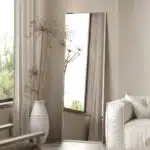 Rectangular beveled wall mirror with a handmade wooden frame, suitable as a floor, full-length, leaner, or overmantle mirror for stylish interiors