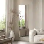 Rectangular beveled wall mirror with a handmade wooden frame, suitable as a floor, full-length, leaner, or overmantle mirror for stylish interiors