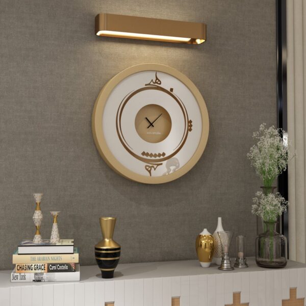 Handmade round wall clock by Merit Home with Persian Hich calligraphy and mirrored glass, shown in black, gray, gold, and beige.