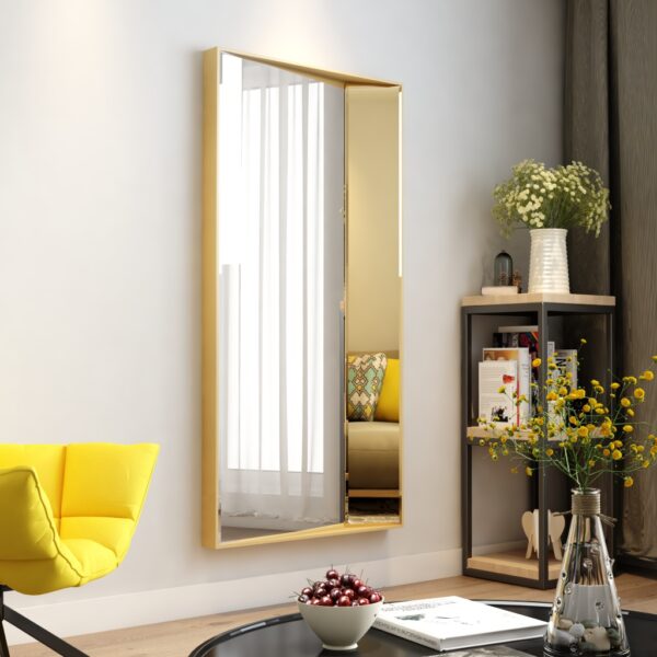 Luxurious full-length wall mirror with a sleek wooden frame, available in black with black-tinted mirror paneling and gold with rose-gold tinted mirror. Featuring a unique half-and-half design with precision beveled edges and an inward angle for a layered effect, this designer mirror adds depth and elegance to modern and classic interiors alike. Ideal for entryways, living rooms, and bedrooms as a functional art piece.