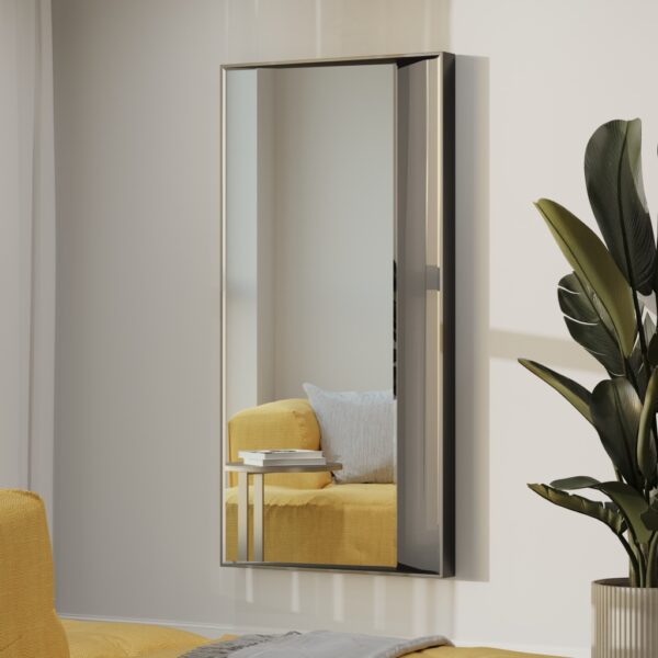 Luxurious full-length wall mirror with a sleek wooden frame, available in black with black-tinted mirror paneling and gold with rose-gold tinted mirror. Featuring a unique half-and-half design with precision beveled edges and an inward angle for a layered effect, this designer mirror adds depth and elegance to modern and classic interiors alike. Ideal for entryways, living rooms, and bedrooms as a functional art piece.