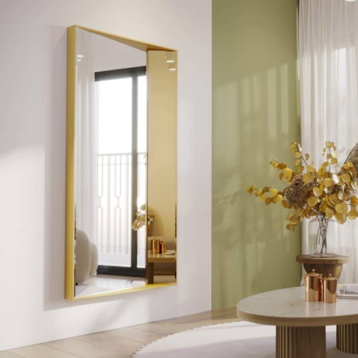 Luxurious full-length wall mirror with a sleek wooden frame, available in black with black-tinted mirror paneling and gold with rose-gold tinted mirror. Featuring a unique half-and-half design with precision beveled edges and an inward angle for a layered effect, this designer mirror adds depth and elegance to modern and classic interiors alike. Ideal for entryways, living rooms, and bedrooms as a functional art piece.