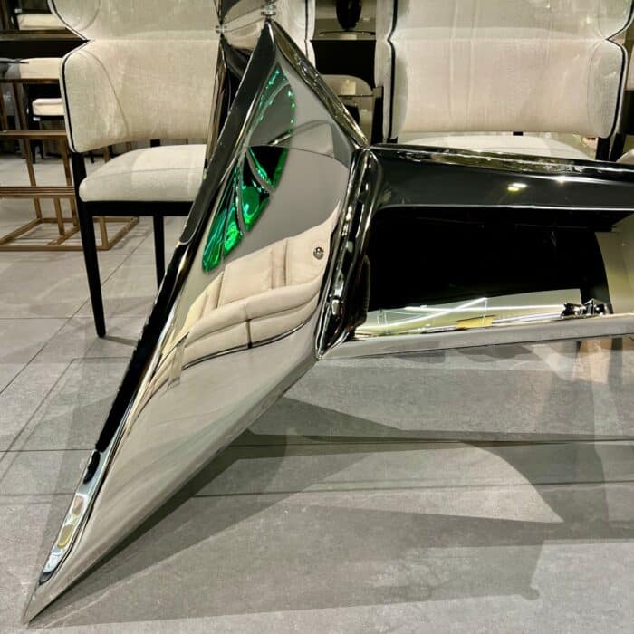 Luxury silver dining table base with glass top