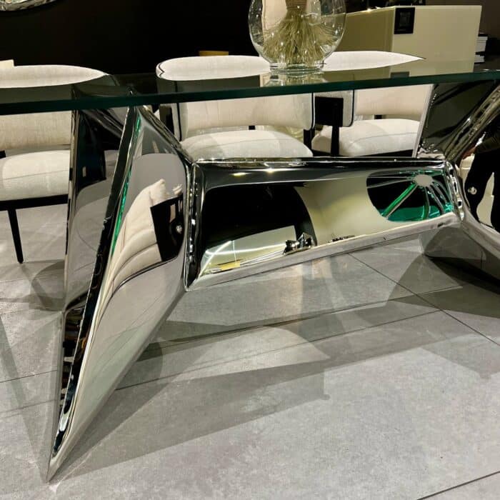 Luxury silver dining table base with glass top