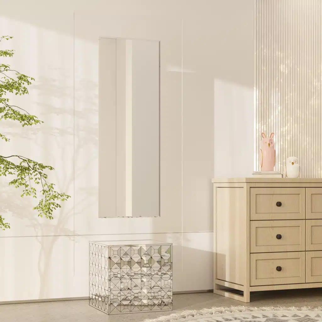 Free-standing full-length mirror with a beveled-edge glass panel, supported by a square cube base adorned with 3D prism-shaped mirrored artwork, perfect for contemporary interiors.