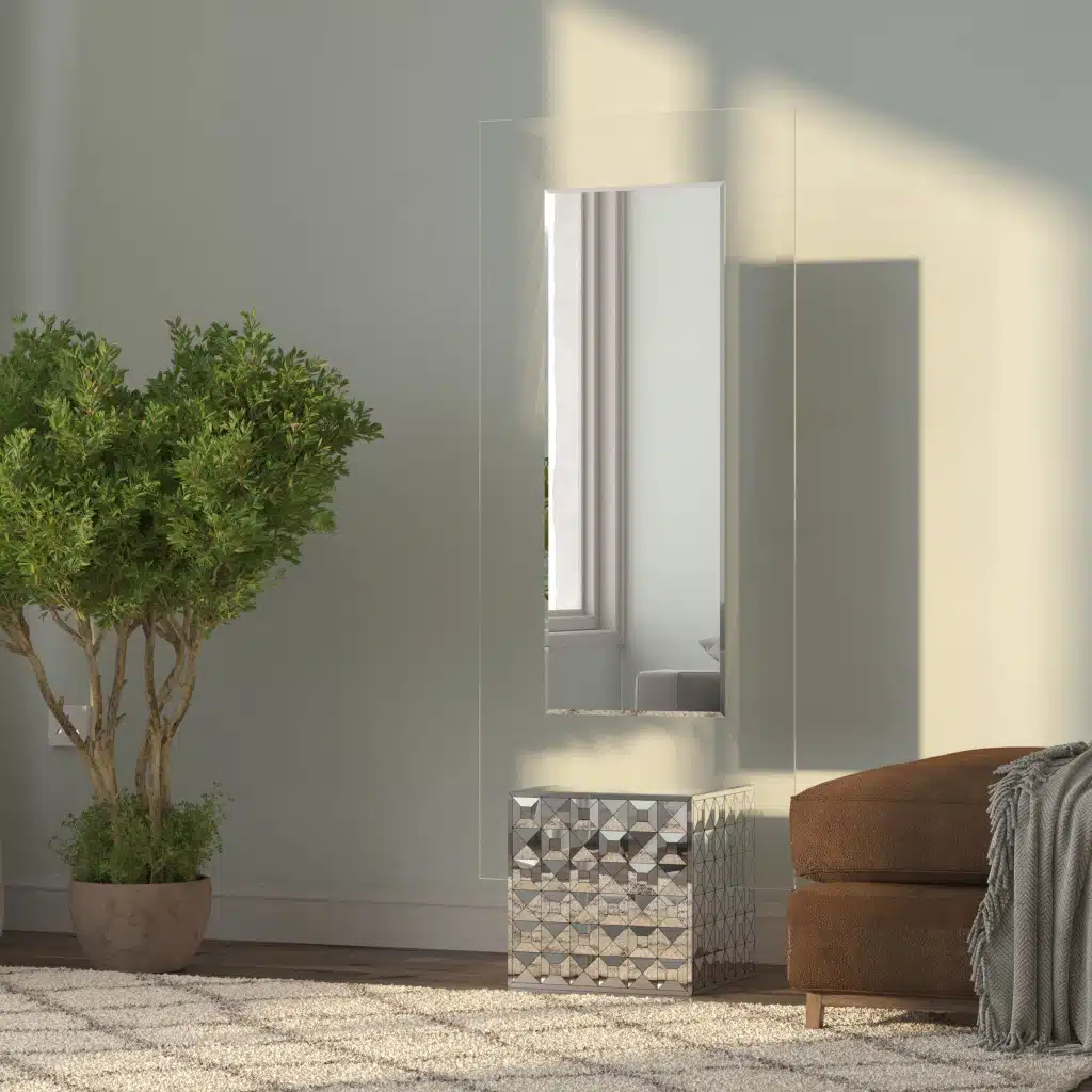 Free-standing full-length mirror with a beveled-edge glass panel, supported by a square cube base adorned with 3D prism-shaped mirrored artwork, perfect for contemporary interiors.