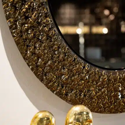 3. Bronze tinted designer mirror with wavey frame texture