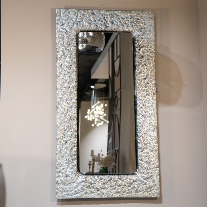 2. Handmade silver wall mirror with unique glass detailing