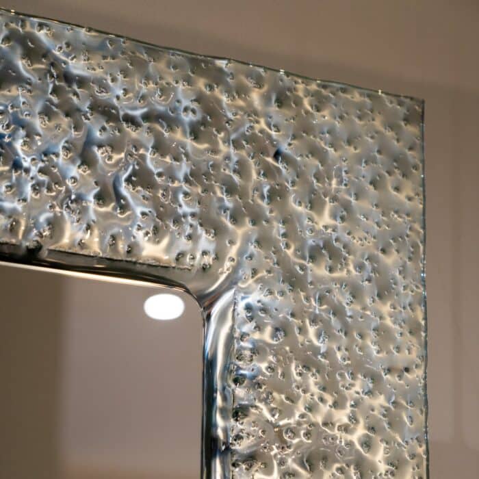 2. Handmade silver wall mirror with unique glass detailing