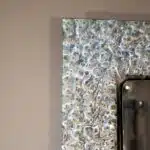 2. Handmade silver wall mirror with unique glass detailing
