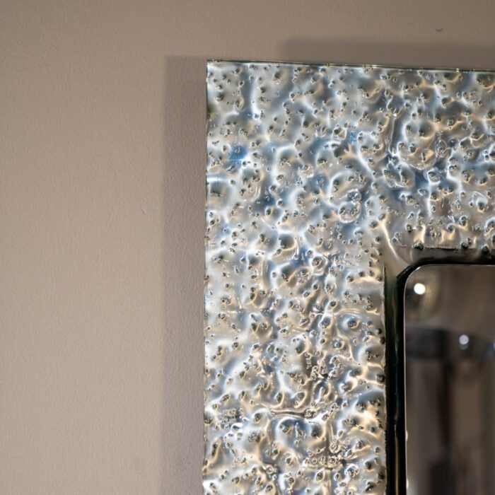 2. Handmade silver wall mirror with unique glass detailing