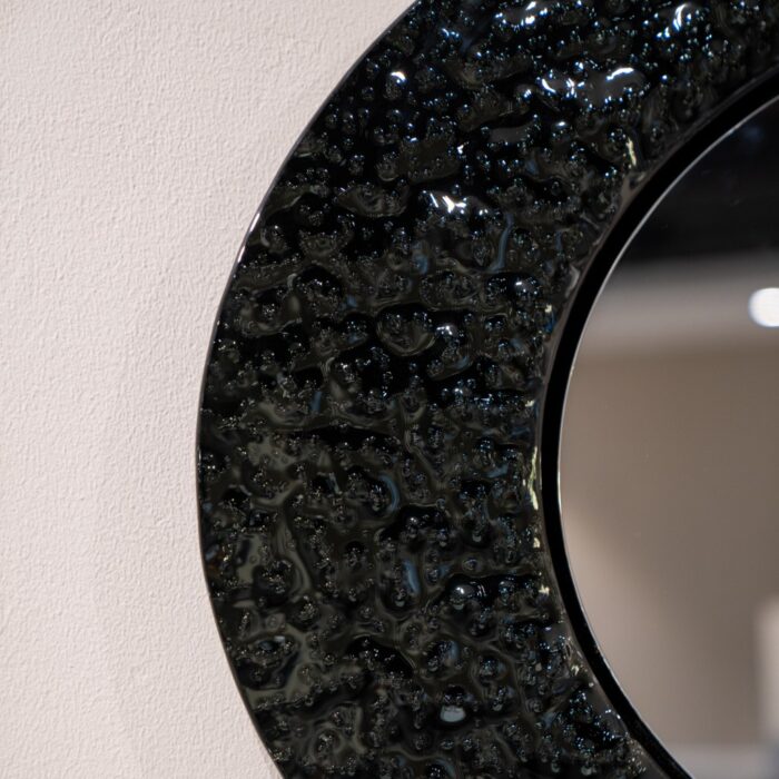 1. Black tinted glass luxury wall mirror with textured surface