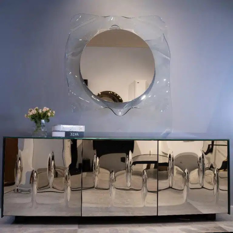 Luxury silver fused glass console table with mirrored top and storage shelves