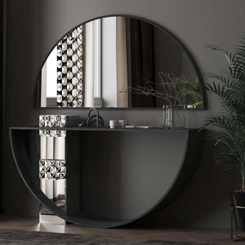 Modern half-moon mirror and console table set with geometric mirrored accents, creating a luxurious and artistic interior design statement