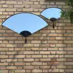 Handmade fan-shaped modern wall mirror set with bevelled glass and curved wood frame, inspired by Japanese design – decorative home wall art