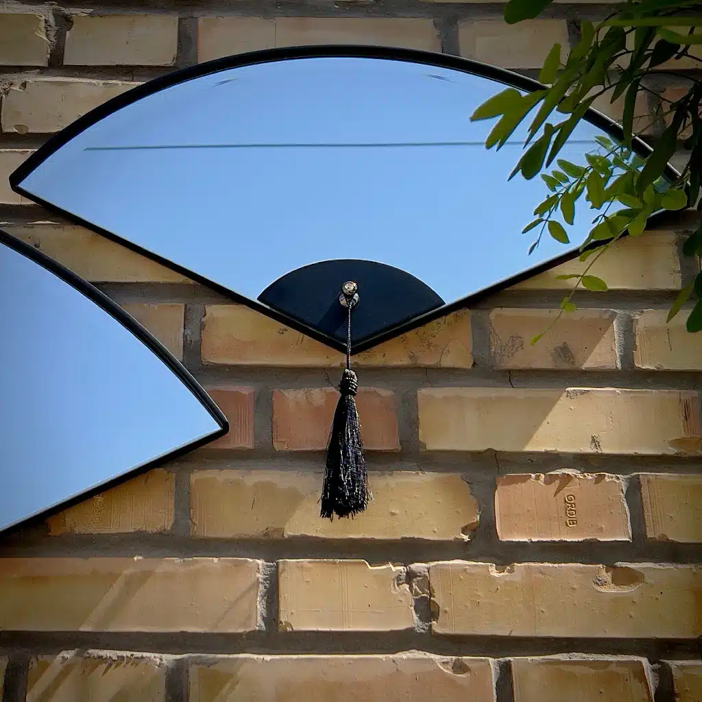 Handmade fan-shaped modern wall mirror set with bevelled glass and curved wood frame, inspired by Japanese design – decorative home wall art