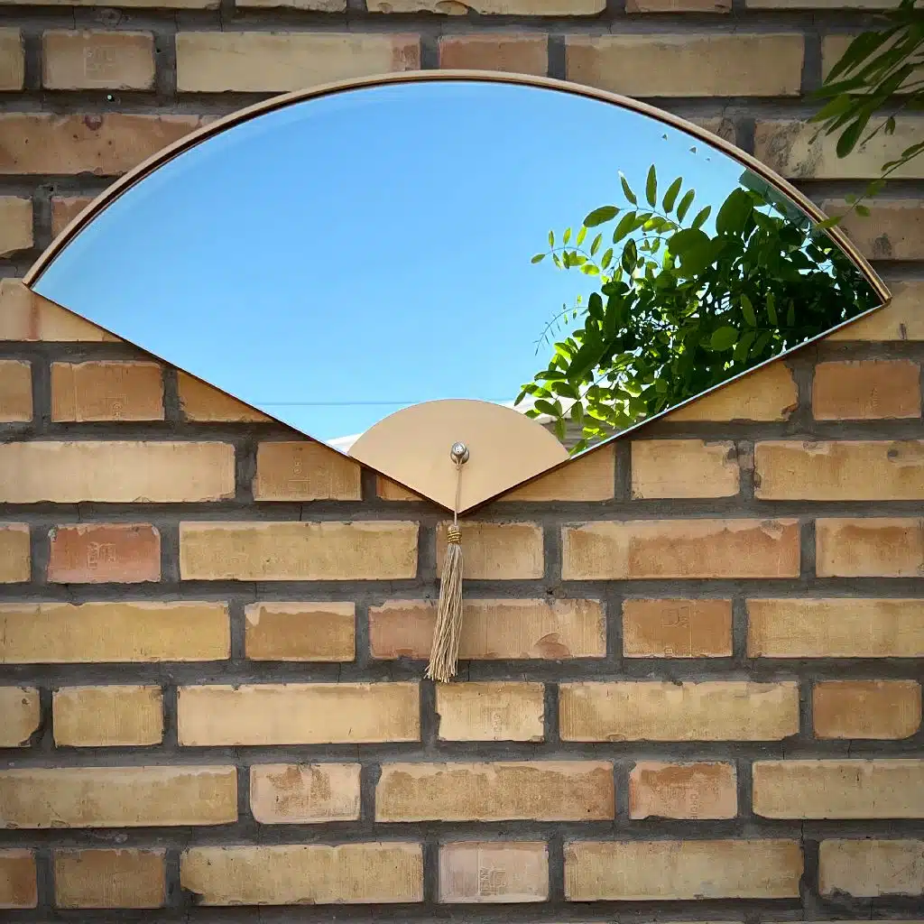 Handmade fan-shaped modern wall mirror set with bevelled glass and curved wood frame, inspired by Japanese design – decorative home wall art