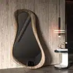 Organic sculptural wall mirror in rustic oak frame