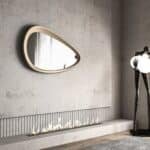 Freeform pebble mirror with semi-matt gold frame